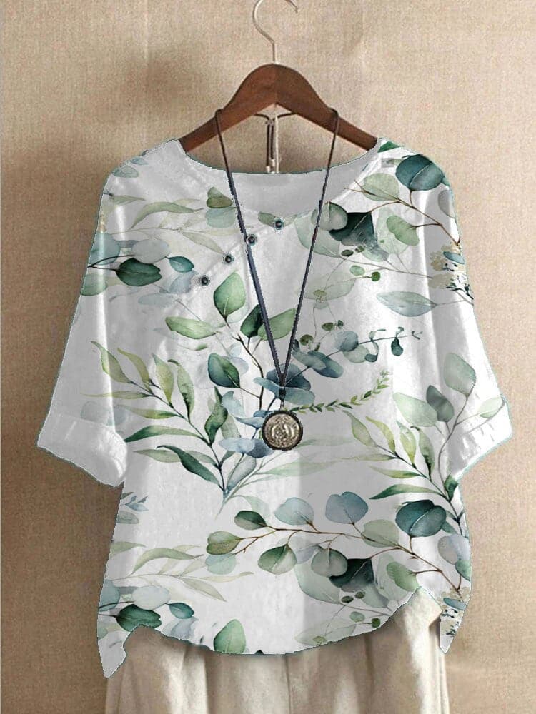 Bluse med blomsterprint og afslappet pasform
