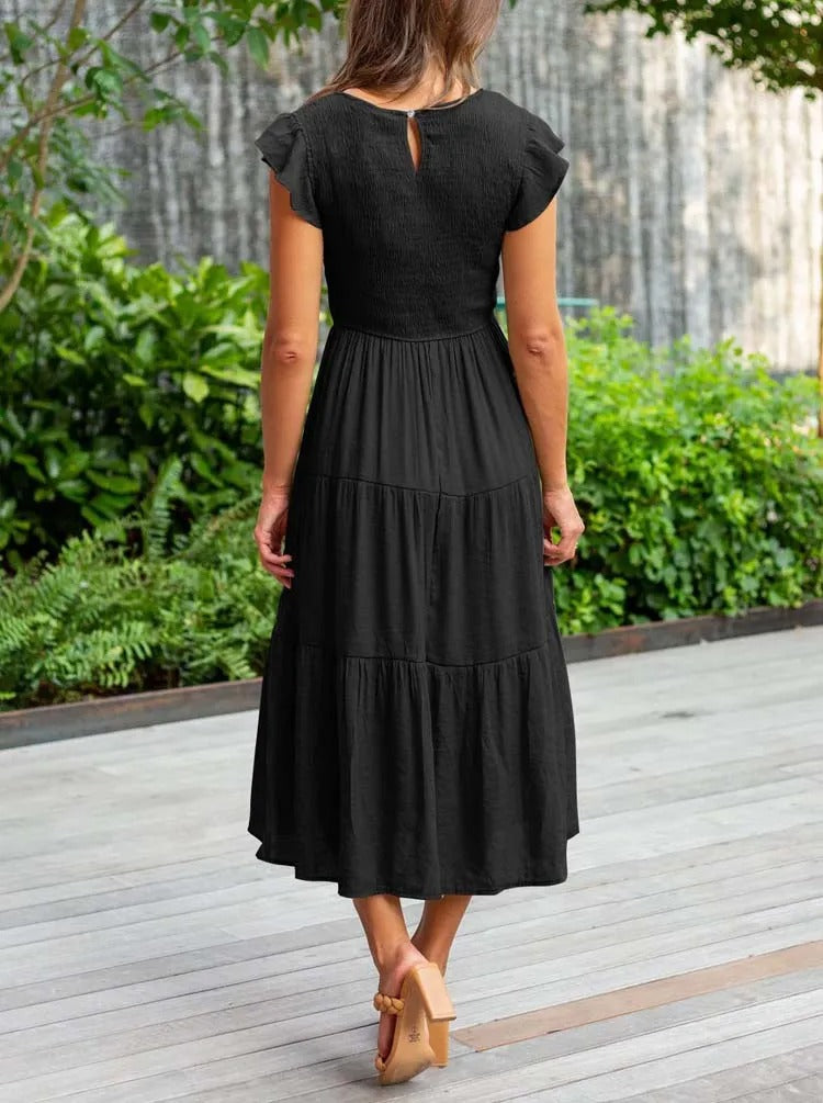 Ronja | Elegant Lagdelt Kjole med Flydende Design