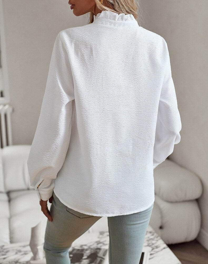 Elegant bluse med flæsedetaljer til damer