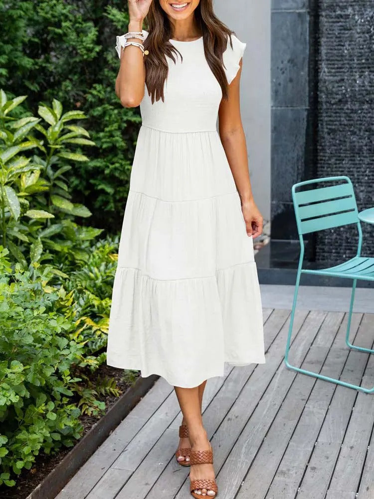 Ronja | Elegant Lagdelt Kjole med Flydende Design
